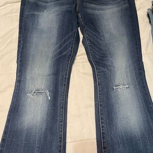 Decree Women's Faded Blue Bootcut Jeans with Knee Distress